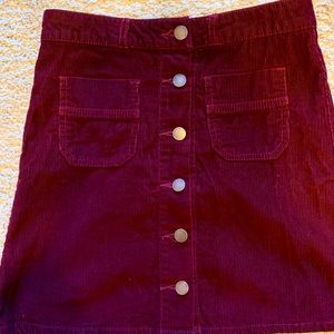 Front button up maroon mini skirt